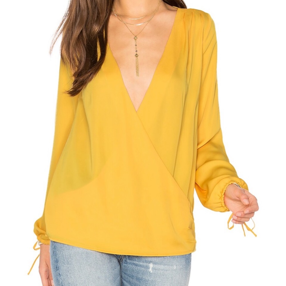 L’Academie yellow long sleeve wrap effect top